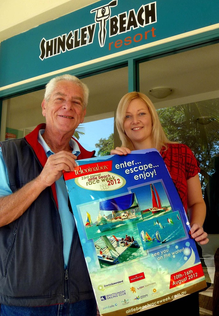 President of WSC Jeff Brown with Charmaine Trundle, assistant manager of Shingley Beach Resort, set about displaying posters. Photo: Bob Feeney - Telcoinabox Airlie Beach Race Week 2012 &copy; Whitsunday Sailing Club